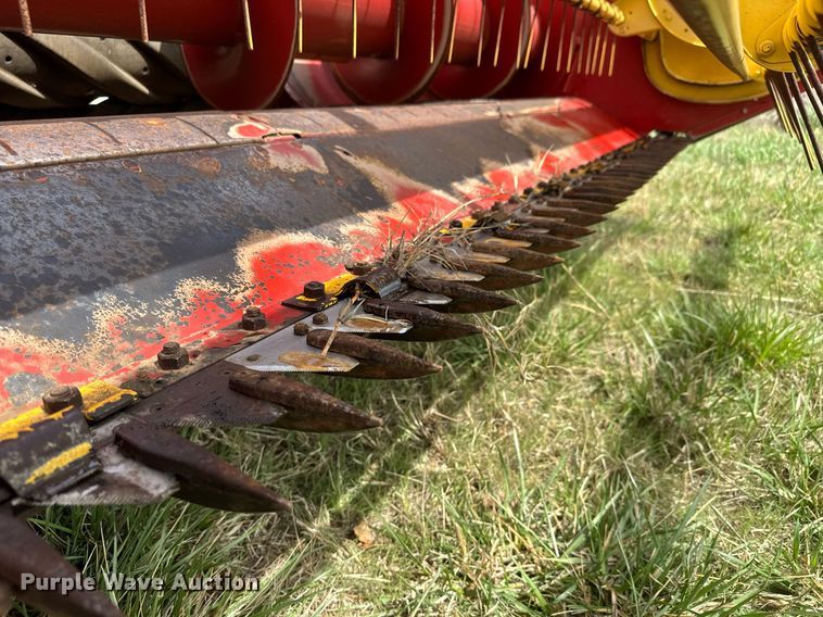 image for item EQ1282 1994 New Holland 116 swather / windrower