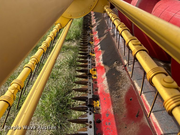 image for item EQ1282 1994 New Holland 116 swather / windrower