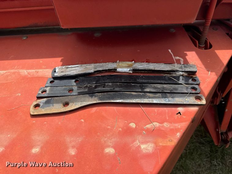 image for item EQ1282 1994 New Holland 116 swather / windrower