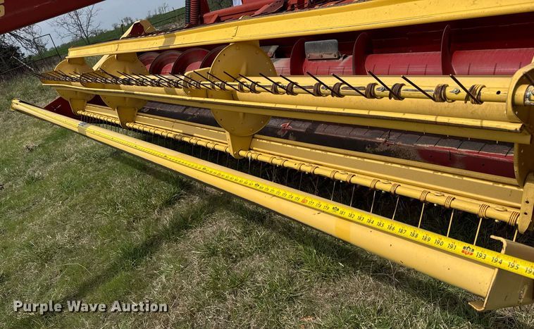 image for item EQ1282 1994 New Holland 116 swather / windrower