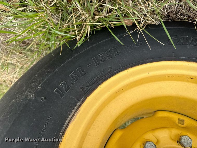 image for item EQ1282 1994 New Holland 116 swather / windrower