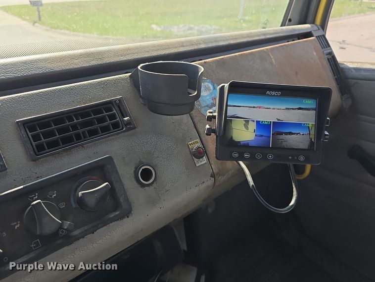 image for item DT6798 2005 Freightliner FL70 Crew Cab flatbed truck