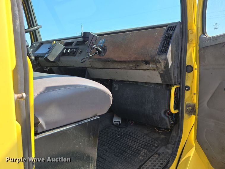 image for item DT6798 2005 Freightliner FL70 Crew Cab flatbed truck