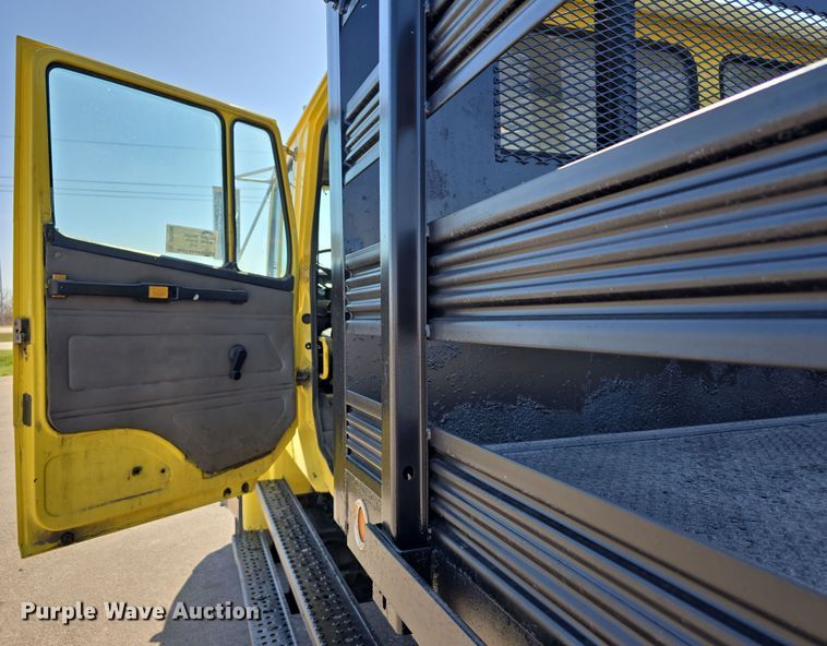 image for item DT6798 2005 Freightliner FL70 Crew Cab flatbed truck