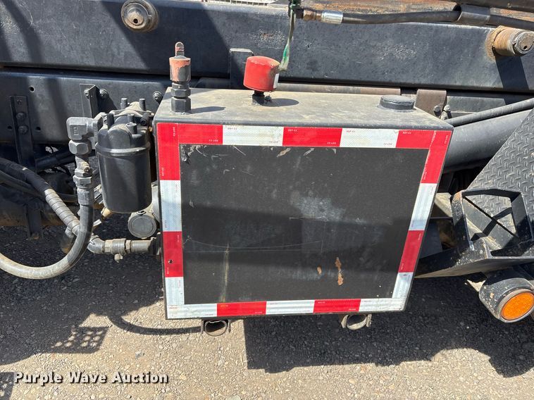 image for item OB9553 2002 Freightliner FL112 roll-off container truck