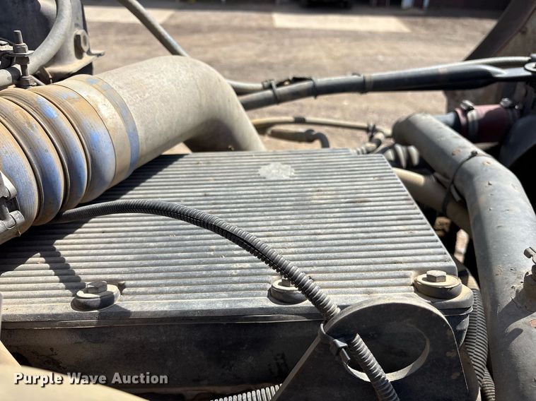 image for item OB9553 2002 Freightliner FL112 roll-off container truck