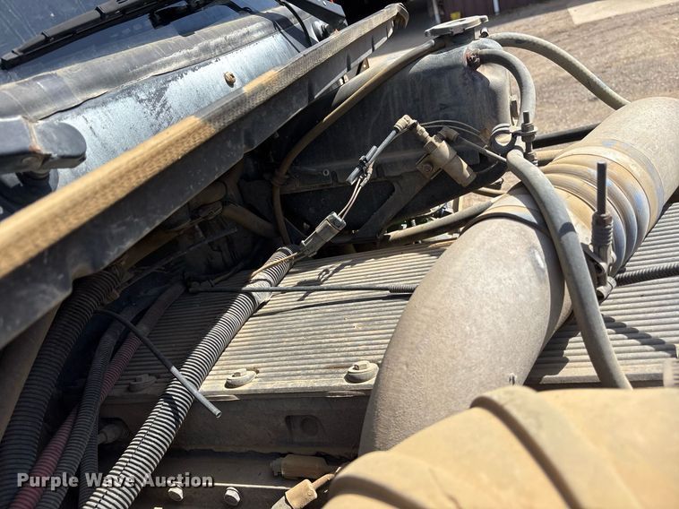 image for item OB9553 2002 Freightliner FL112 roll-off container truck