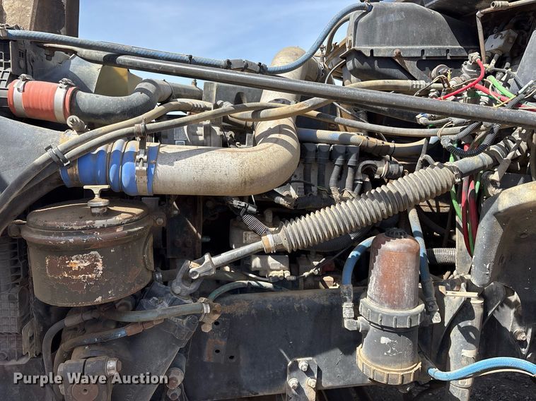 image for item OB9553 2002 Freightliner FL112 roll-off container truck