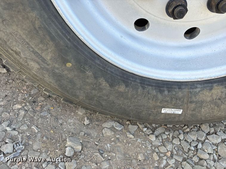 image for item OB9553 2002 Freightliner FL112 roll-off container truck