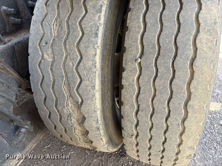 image for item OB9553 2002 Freightliner FL112 roll-off container truck