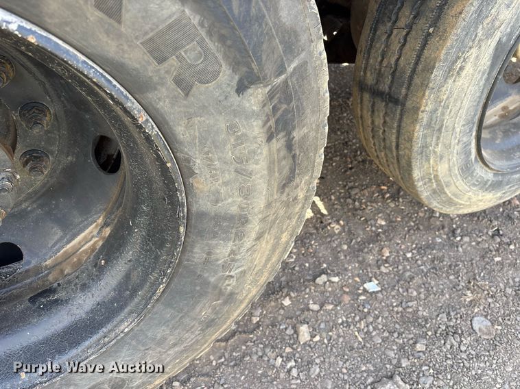 image for item OB9553 2002 Freightliner FL112 roll-off container truck