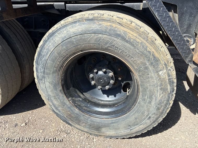 image for item OB9553 2002 Freightliner FL112 roll-off container truck