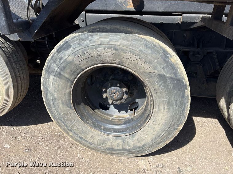 image for item OB9553 2002 Freightliner FL112 roll-off container truck