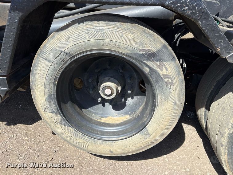 image for item OB9553 2002 Freightliner FL112 roll-off container truck