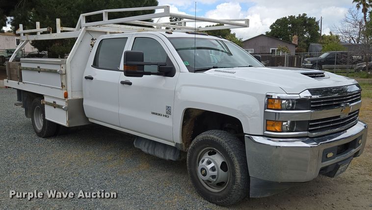 image for item EC0911 2018 Chevrolet Silverado 3500HD Crew Cab flatbed pickup truck