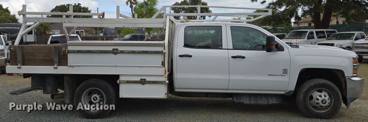 image for item EC0911 2018 Chevrolet Silverado 3500HD Crew Cab flatbed pickup truck