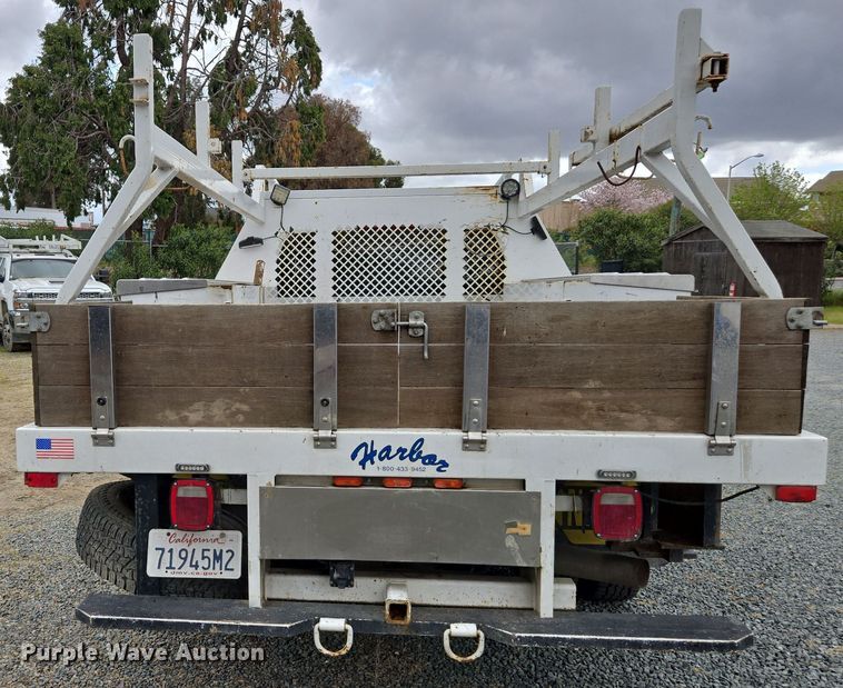 image for item EC0911 2018 Chevrolet Silverado 3500HD Crew Cab flatbed pickup truck