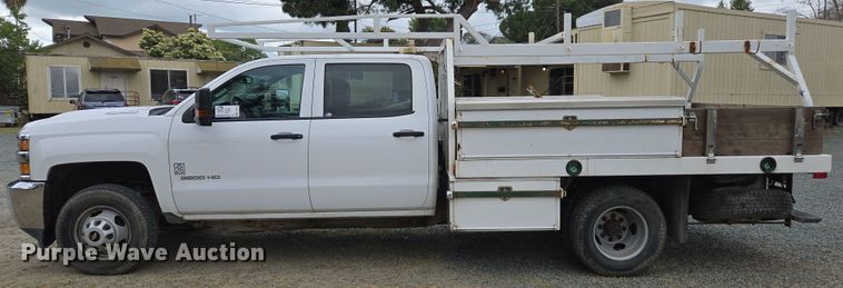 image for item EC0911 2018 Chevrolet Silverado 3500HD Crew Cab flatbed pickup truck