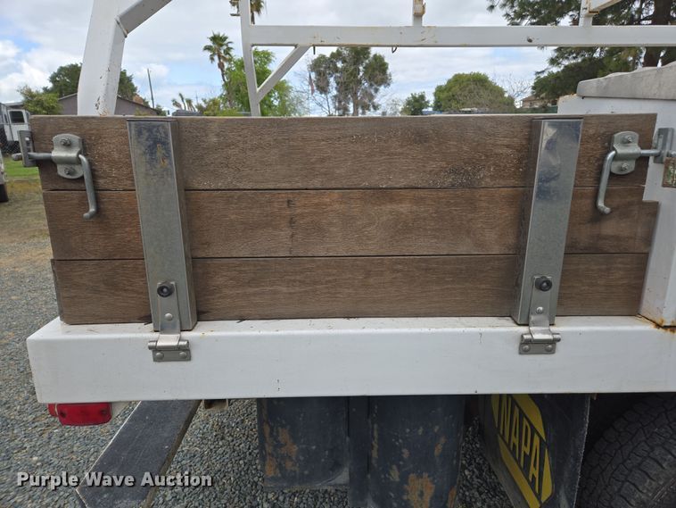 image for item EC0911 2018 Chevrolet Silverado 3500HD Crew Cab flatbed pickup truck