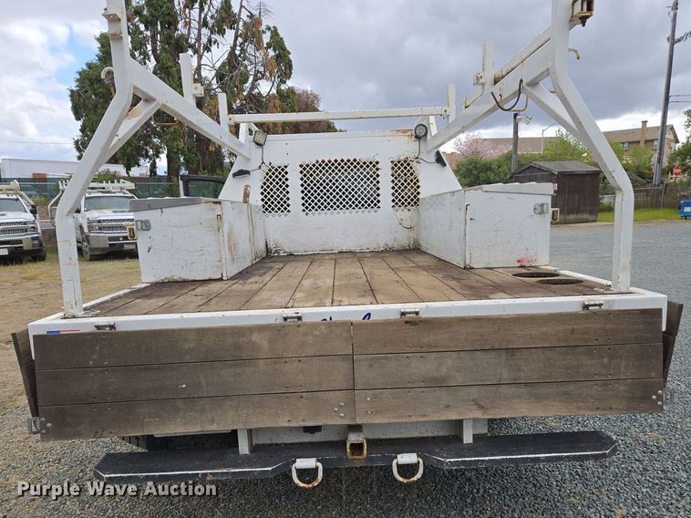 image for item EC0911 2018 Chevrolet Silverado 3500HD Crew Cab flatbed pickup truck