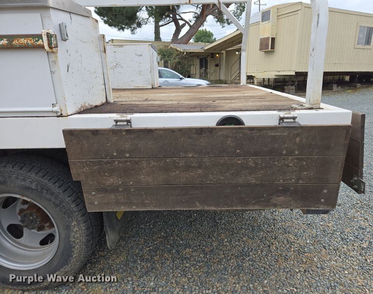 image for item EC0911 2018 Chevrolet Silverado 3500HD Crew Cab flatbed pickup truck