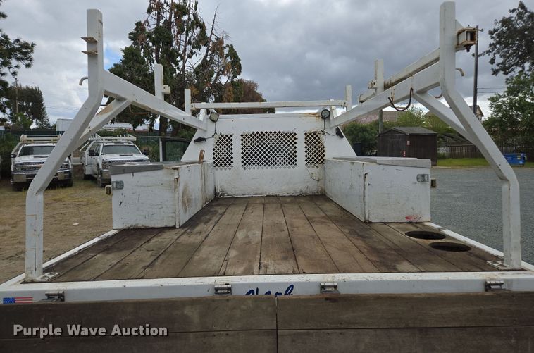 image for item EC0911 2018 Chevrolet Silverado 3500HD Crew Cab flatbed pickup truck