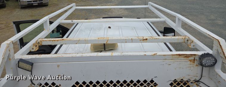 image for item EC0911 2018 Chevrolet Silverado 3500HD Crew Cab flatbed pickup truck