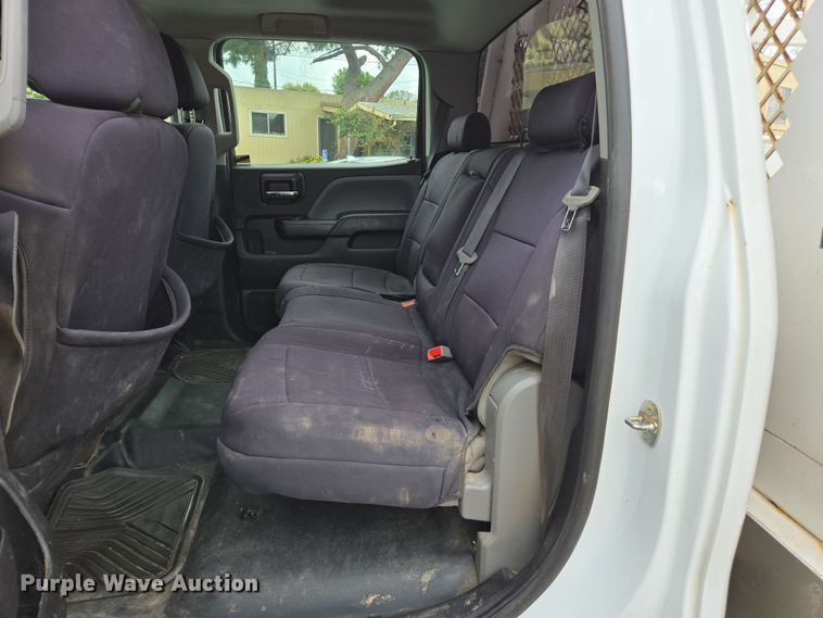 image for item EC0911 2018 Chevrolet Silverado 3500HD Crew Cab flatbed pickup truck