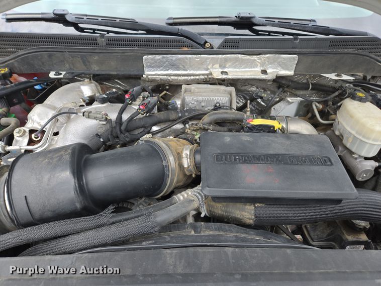 image for item EC0911 2018 Chevrolet Silverado 3500HD Crew Cab flatbed pickup truck