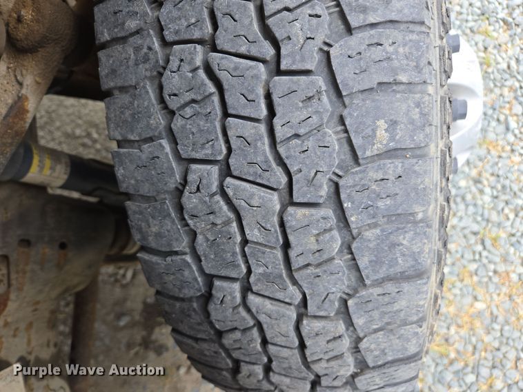 image for item EC0911 2018 Chevrolet Silverado 3500HD Crew Cab flatbed pickup truck