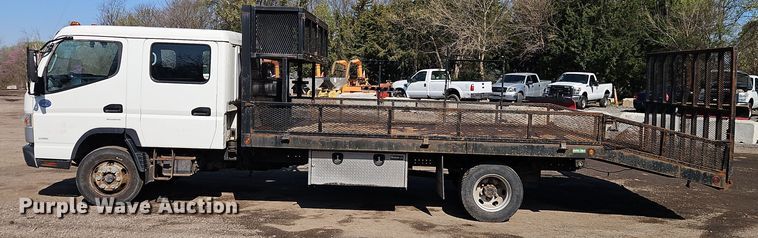 image for item EI8938 2017 Mitsubishi Fuso FEC72KL3WUHJ Crew Cab flatbed truck