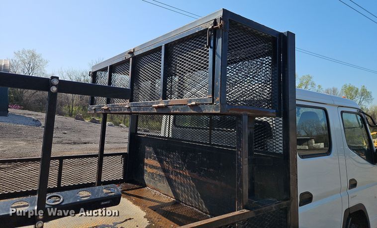 image for item EI8938 2017 Mitsubishi Fuso FEC72KL3WUHJ Crew Cab flatbed truck