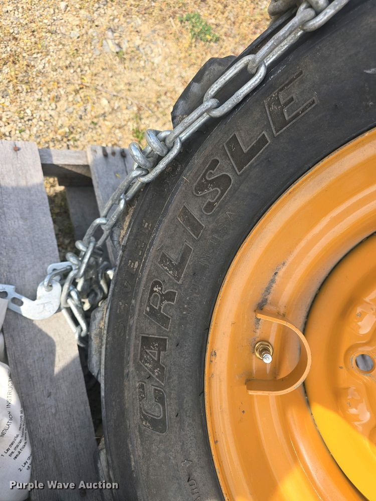 image for item EK5152 (3) Carlisle skid steer tires and wheels