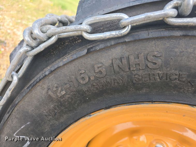 image for item EK5152 (3) Carlisle skid steer tires and wheels