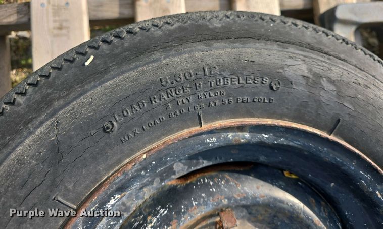 image for item EK5152 (3) Carlisle skid steer tires and wheels