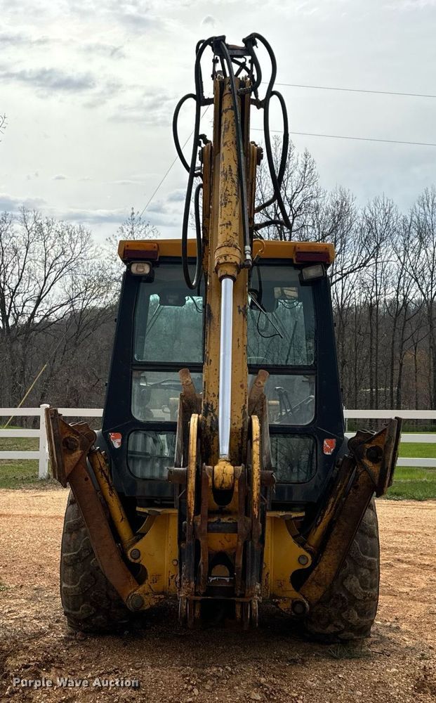 image for item DV1899 1997 John Deere 310E backhoe