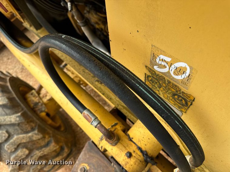 image for item DV1899 1997 John Deere 310E backhoe