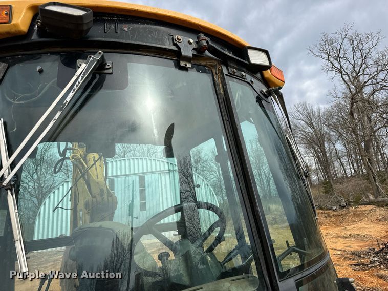 image for item DV1899 1997 John Deere 310E backhoe