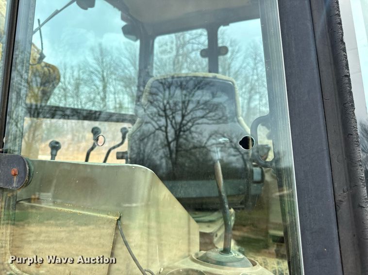 image for item DV1899 1997 John Deere 310E backhoe