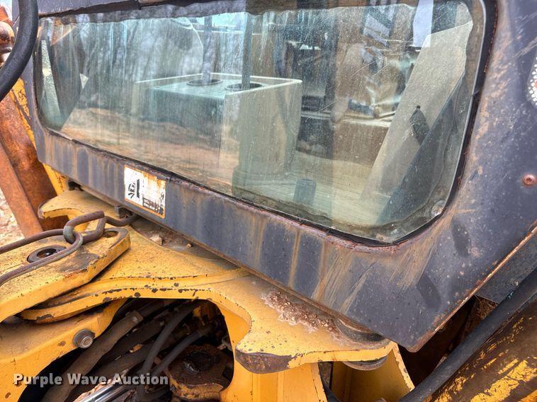 image for item DV1899 1997 John Deere 310E backhoe
