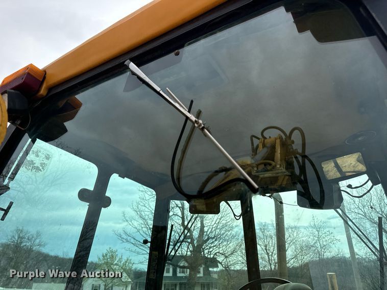 image for item DV1899 1997 John Deere 310E backhoe