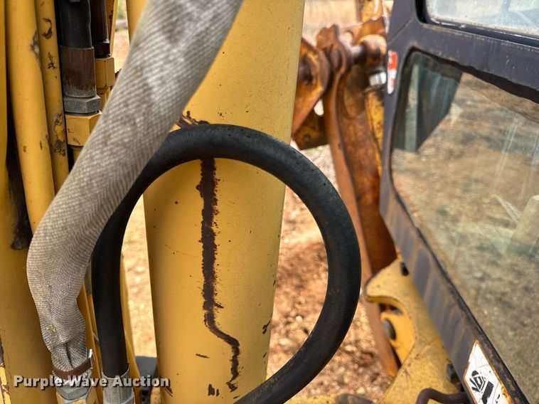 image for item DV1899 1997 John Deere 310E backhoe