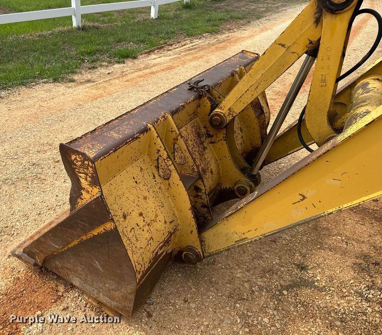 image for item DV1899 1997 John Deere 310E backhoe