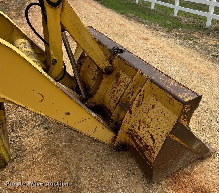 image for item DV1899 1997 John Deere 310E backhoe