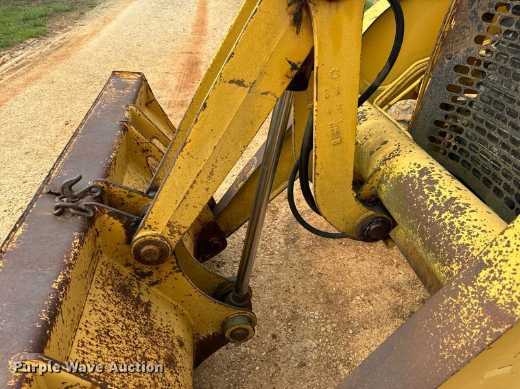 image for item DV1899 1997 John Deere 310E backhoe