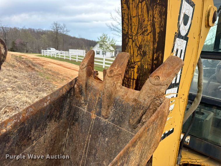 image for item DV1899 1997 John Deere 310E backhoe