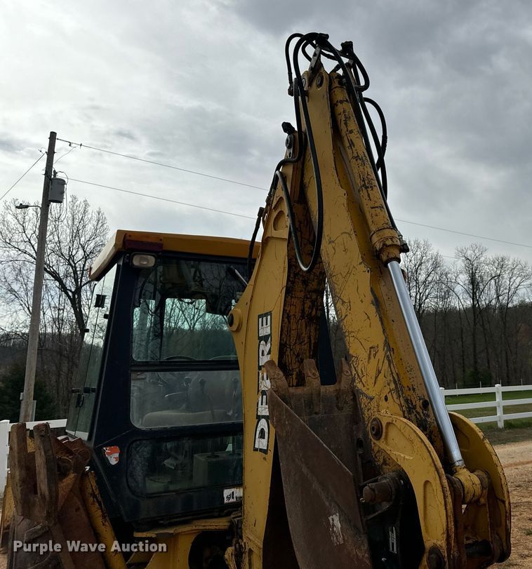 image for item DV1899 1997 John Deere 310E backhoe
