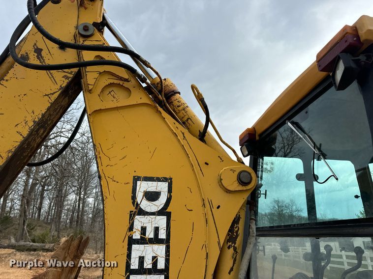 image for item DV1899 1997 John Deere 310E backhoe