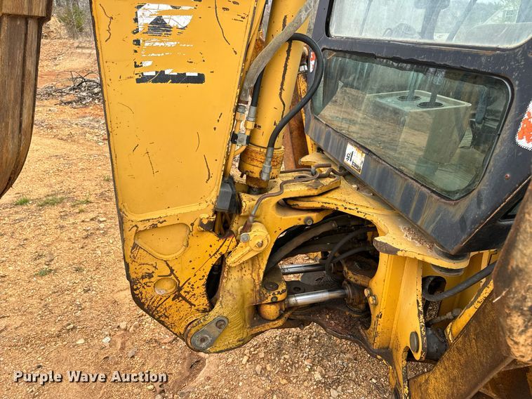 image for item DV1899 1997 John Deere 310E backhoe