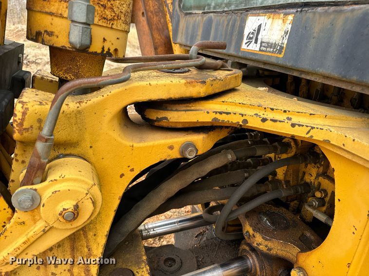 image for item DV1899 1997 John Deere 310E backhoe